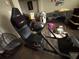 Next Level Racing Sim Cockpit with Thrustmaster Wheel