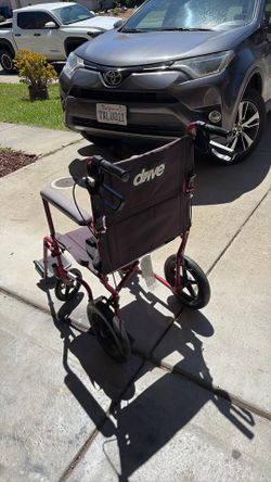 Wheelchair walker, excellent condition super light easy to carry and fold super light