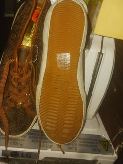 Woman's sneakers MK size 11M