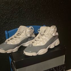 Grey  Jordan 11’s.    