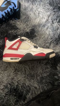 Jordan 4s red cement