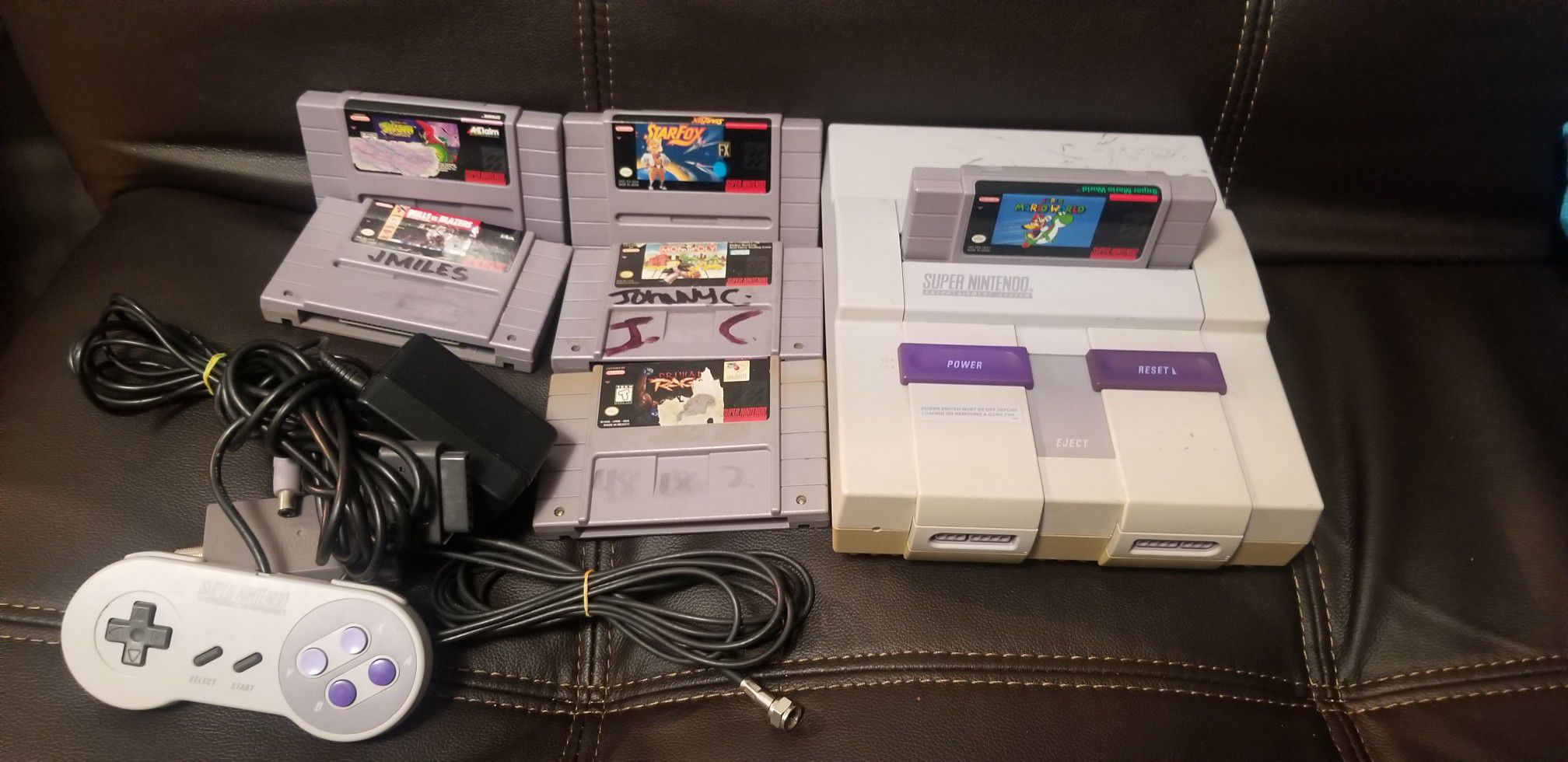 Super Nintendo with games