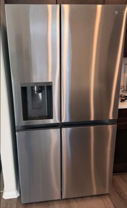 L G   BRAND   27  CU. FT.  SIDE  BY  SIDE  SLIGHTLY  USED  STAINLESS  REFRIGERATOR