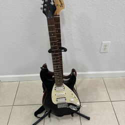 Two electric guitars. One Brownsville and Squier, plus Amplifier Line 6. Everything in good condition.