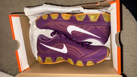Purple and yellow nikes
