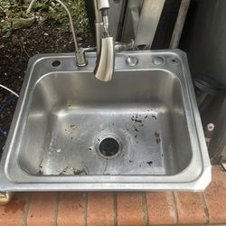 Used sink and faucet