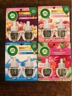 New Air Wick Essential Oils scented oil refills. . Each pack has two refills, total 1.34 FL. OZ. Scents include White Flowers & Melon Summer Delights,