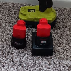 Ryobi Drill And 2 Milwaukee Battery 