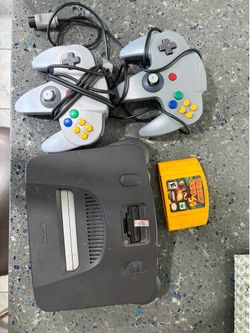 Nintendo 64 2 controllers and donkey Kong game