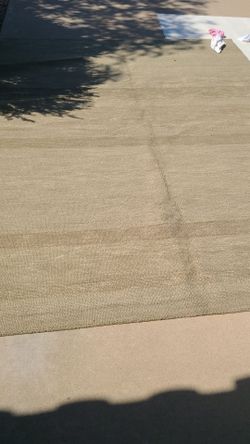 Wool 8 ft by 10 ft rug for sale.