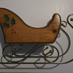 Vintage hand painted wood and metal brass Christmas sleigh.