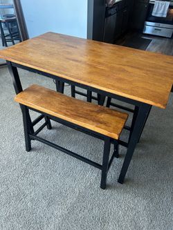 Wood table set with 3 benches - good condition