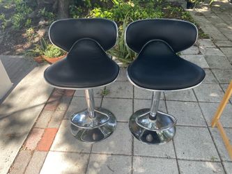 Pair of black chrome adjustable bar stools