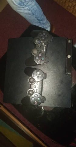Ps3 with console, USB cable, assassin creed, God of war etc
