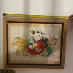 Vintage Japanese artwork in wood frame