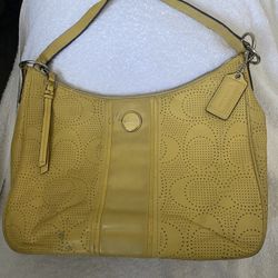 Yellow leather coach purse 