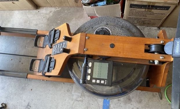Single rowing fitness machine