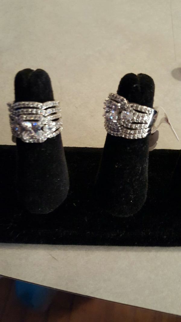 Rings.....Size 7...Diamonique 4 piece 10 karat white gold filled wedding set