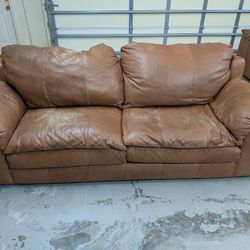 Free Comfortable brown leather sofa in good condition.  Free for pick-up Thru Wednesday 