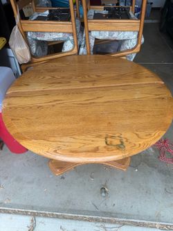 Round kitchen table with extension & chairs