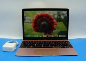 MacBook 12 inch rose gold in super good condition 8gb ram 250gb hardrive with charger