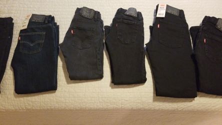 Levi's slim fit and skinny black Jean's. Boys size 8-10