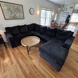 Sectional Couch + Circular Coffee Table 