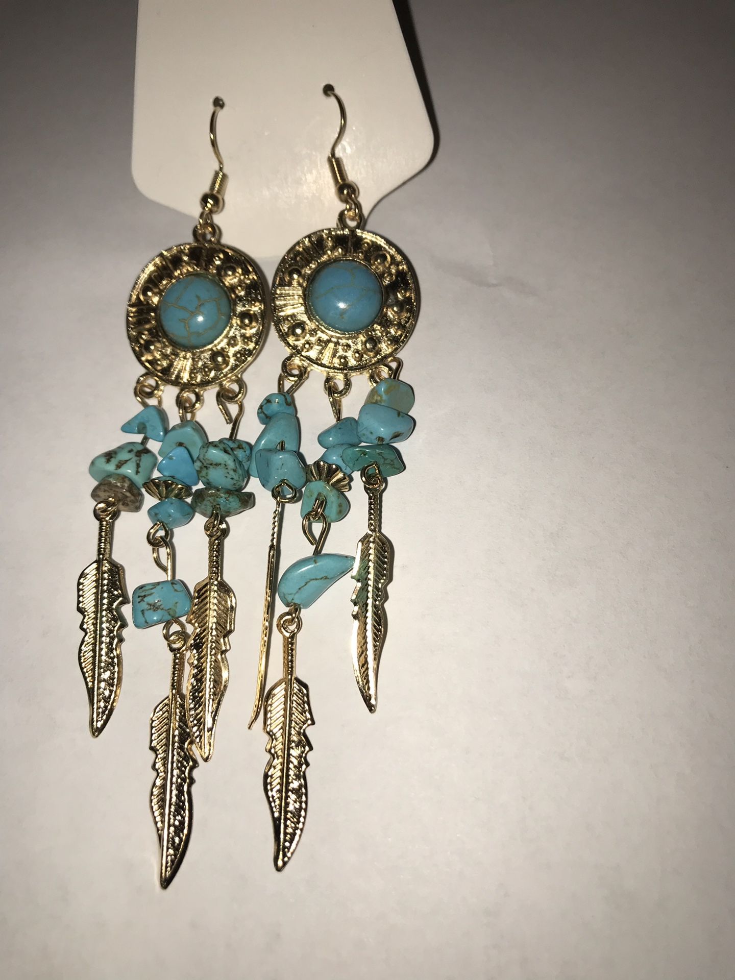 Gold tone and turquoise earrings