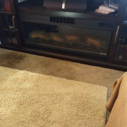 FREE Brown Leather Couch And TV Stand With Heater Inside