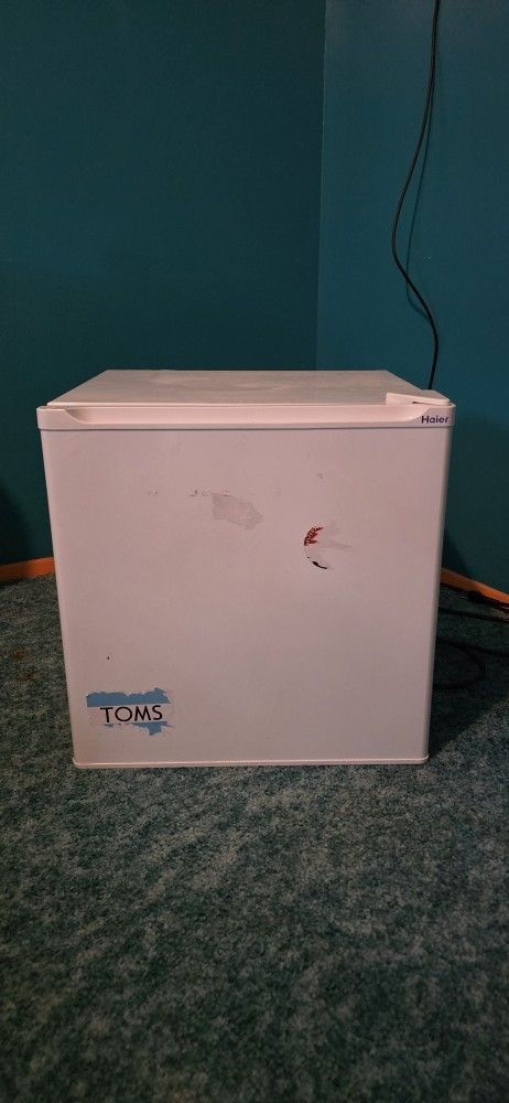 Small mini fridge with freezer compartment
