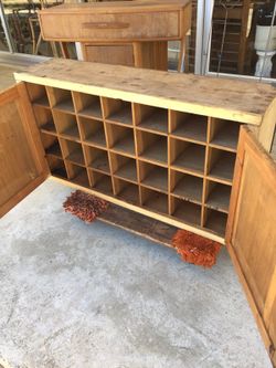 Pine cabinet with 28 cubbies