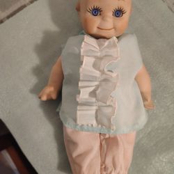 12 Inches Porcelain Jointed  Stringed Rare Kewpie Doll