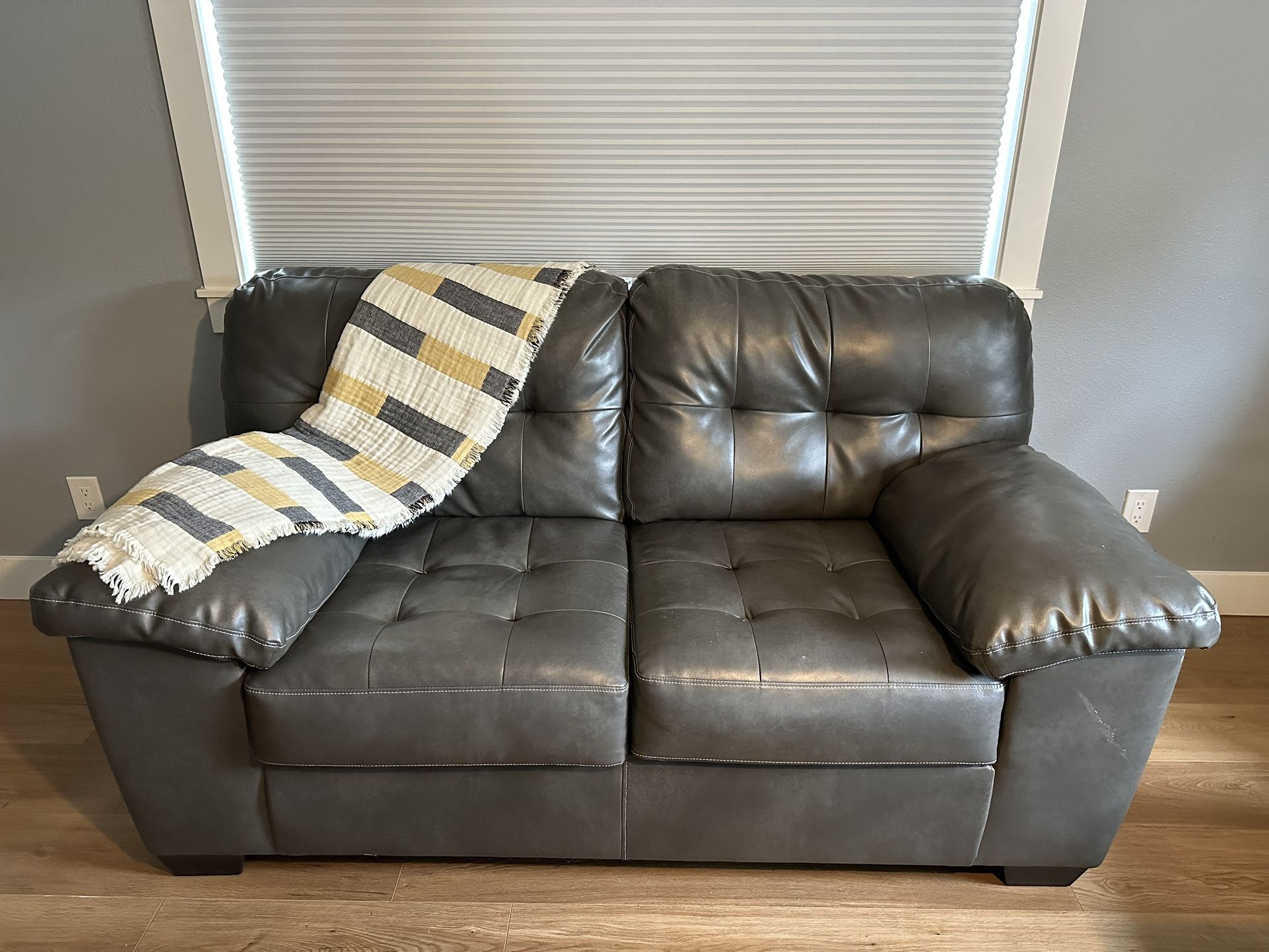 Grey Faux Leather Couch - $250