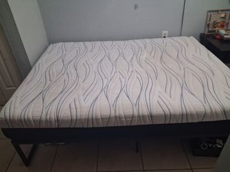 Queen size serta mattress and black metal platform