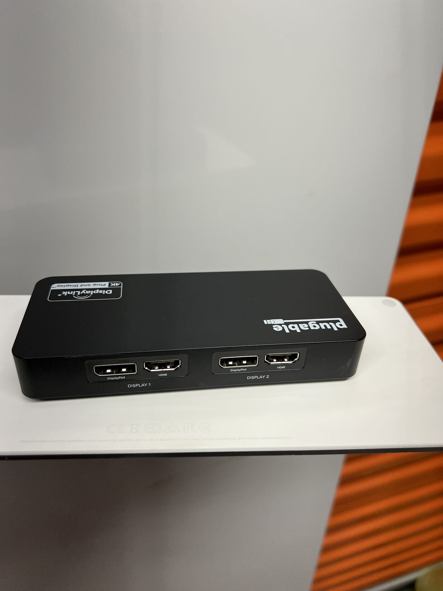 Plugable 4K displayport dual monitor adapter.