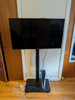 "40" Smart TV  and  TV stand with wheels