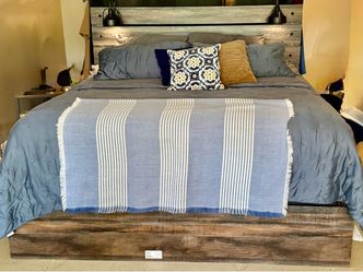 Ashley Home Furniture Drystan King Size Storage Bed with Reading Lamps.