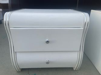Set of faux leather side tables