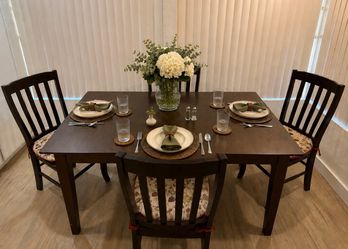 Solid wood table and four chairs