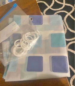 Shower curtain with hooks