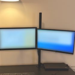 Two LCD Monitors And Dual Monitor Arm Stand