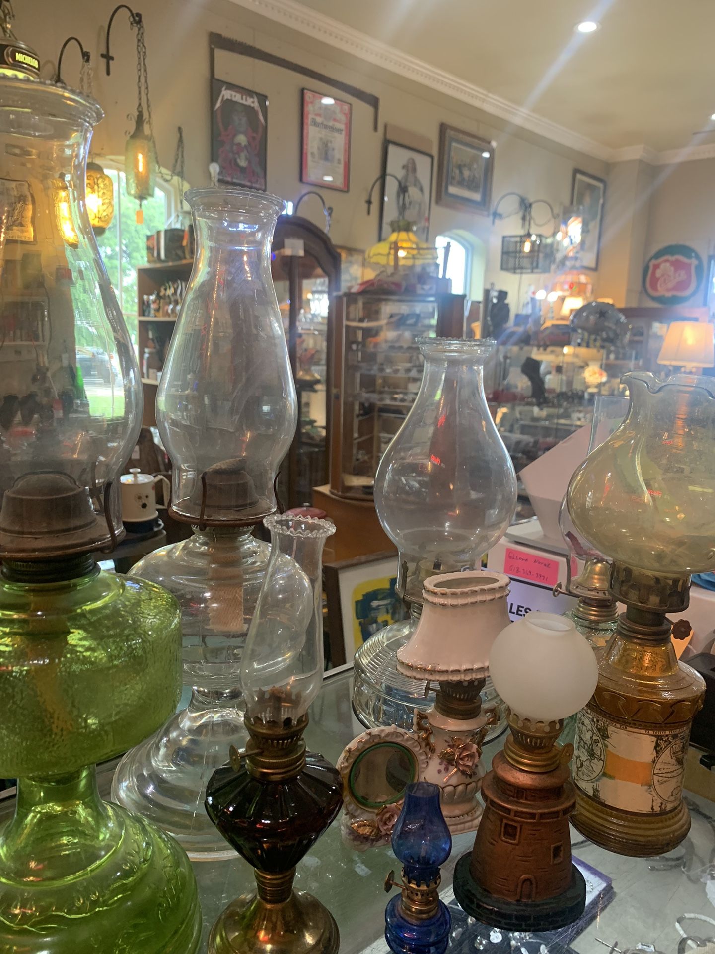 Antique oil lamps of all sizes and shapes.  Prices between 10 to 35.00.  Johanna at Antiques and More. Located at 316b Main Street Buda. Antiques vint