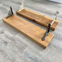 2 Wall Cedar Wood Shelves with metal brackets $45 each  Can be sold separately. 