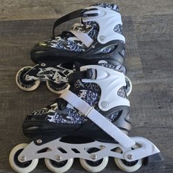 Kuxuan Adjustable Roller Skates Great Condition 