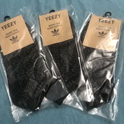 3 New Pairs Of Socks Yeezys Unisex $20. 