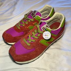 MAKE AN OFFER! Mens 11.5 New Balance 574 Stray Rats 'Red' features a vibrant magenta nylon base with textured brick red suede overlays