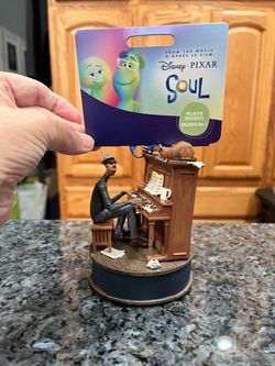 Disney Pixar Soul Musical Ornament with a Piano.  From The movie D’Apres Le Film.  Brand new with tags.   Battery operated.