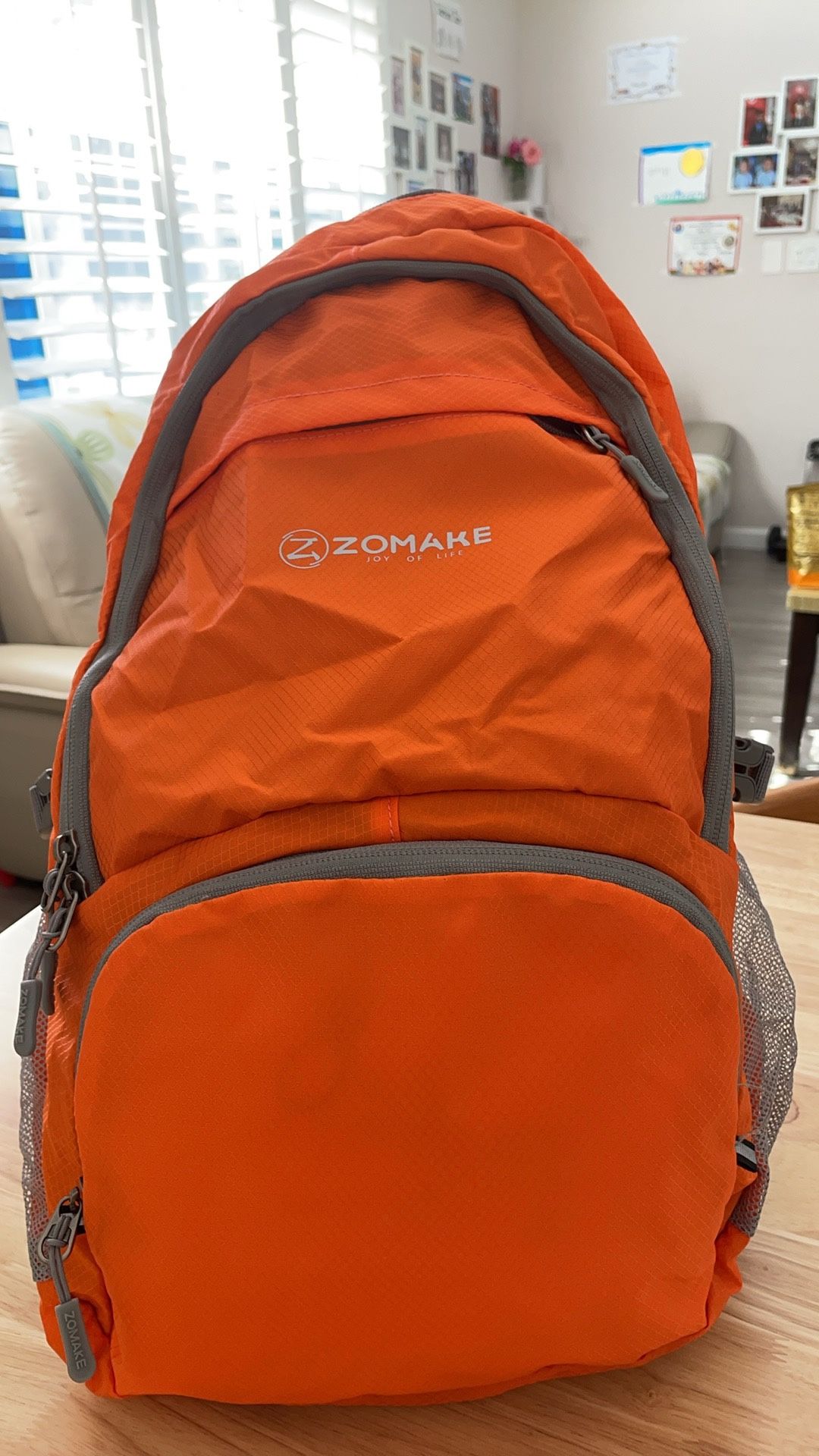 ZOMAKE Lightweight Packable Backpack 30L - Foldable Hiking Backpacks Water Resistant Compact Folding Daypack for Travel(Orange)