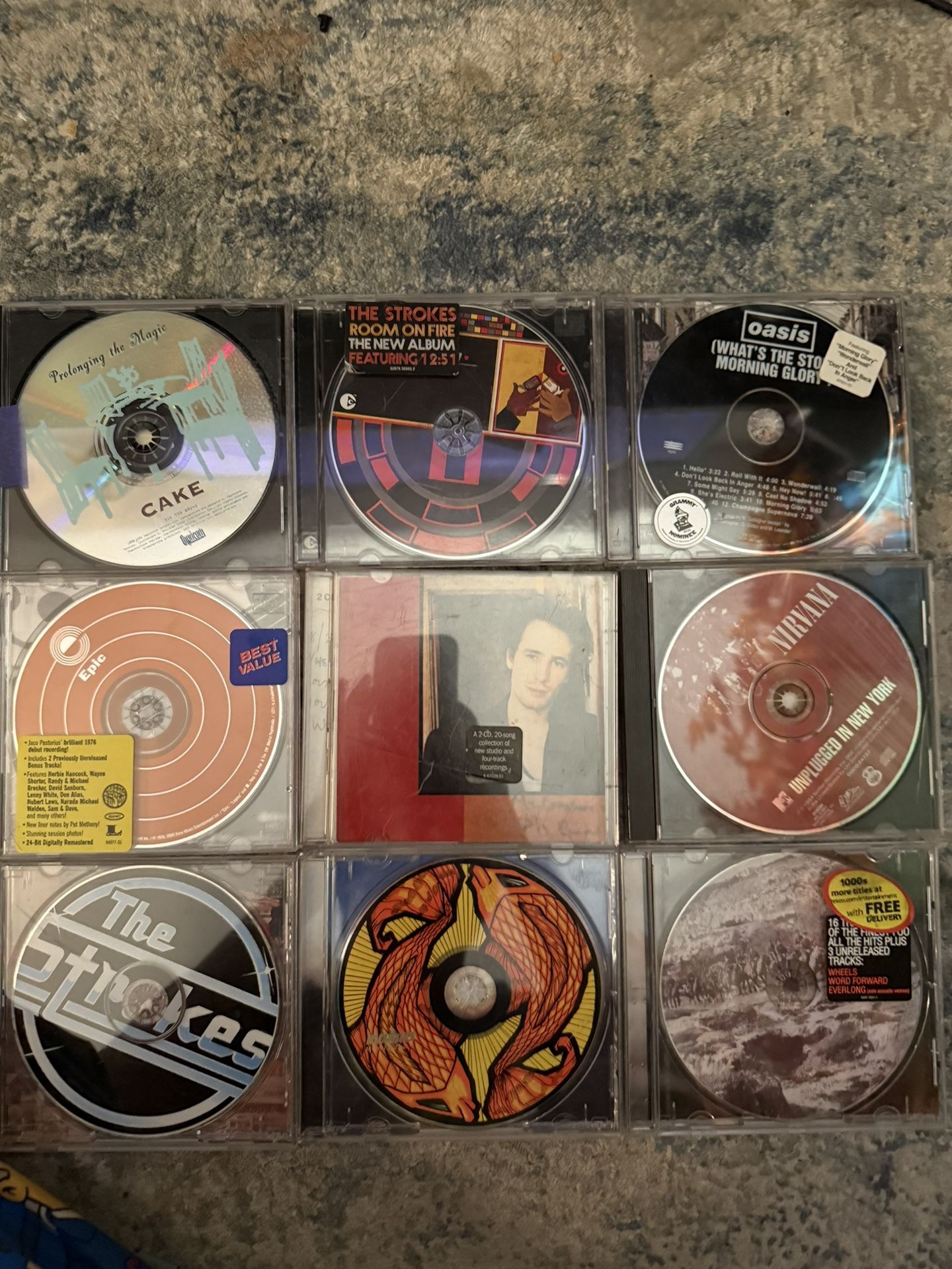 Rock Music Vinyl CD Lot Nirvana Oasis The Strokes Jeff Buckley Incubus Cake Foo Fighters