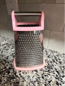 Pink cheese grater